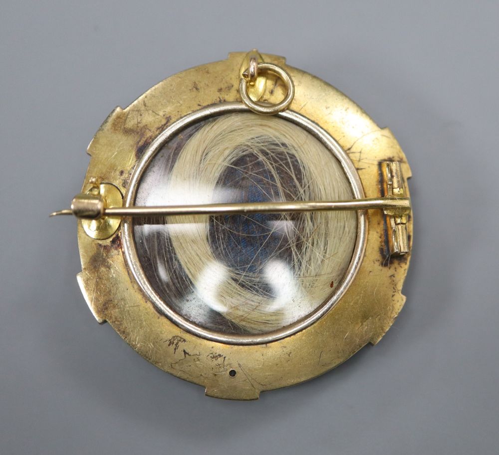 A 19th century gold (tests as 14ct), enamel and pearl target pendant brooch,